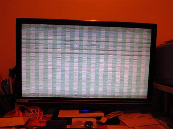 Computer suddenly dies; screen displays weird flickering lines, then restarts