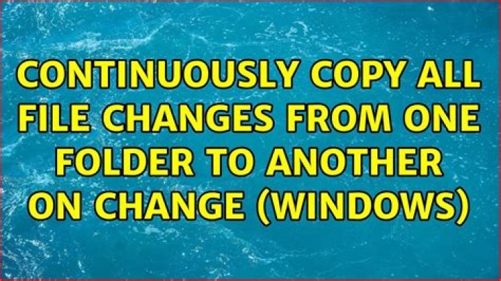 Continuously copy all file changes from one folder to another on change (Windows)