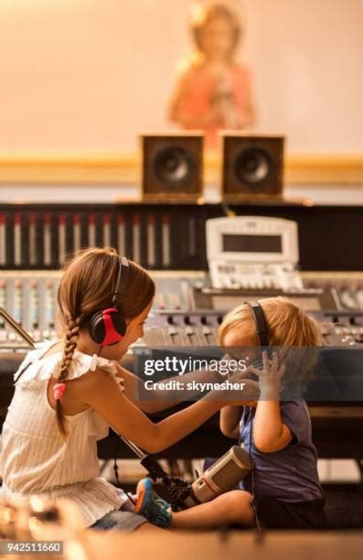 Headphones are playing a local radio station