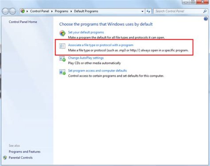 How can I reset default programs in Windows 7?