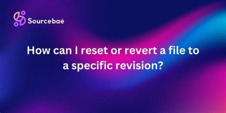 How can I reset or revert a file to a specific revision?
