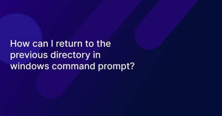 How can I return to the previous directory in windows command prompt?