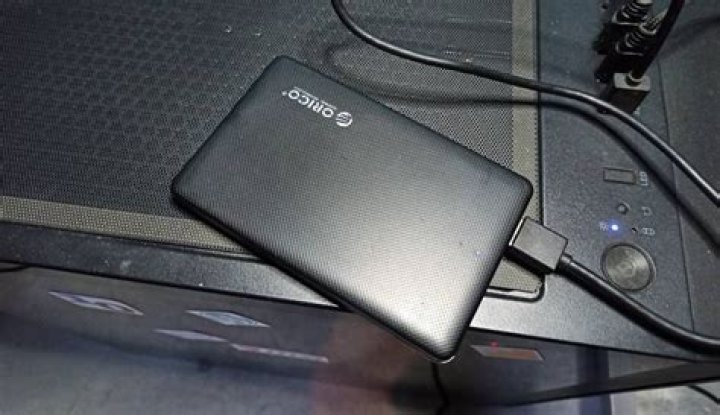 How do I access an external hard drive plugged into my router?