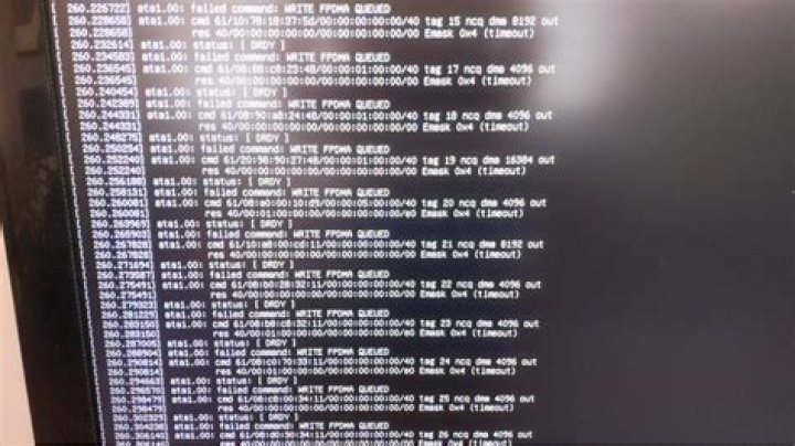 How do I fix WRITE FPDMA QUEUED messages if the SMART report isn't showing any errors?