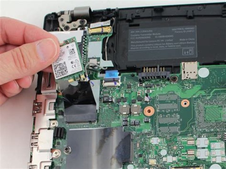 How do I get the wireless card on a Lenovo S205 working?