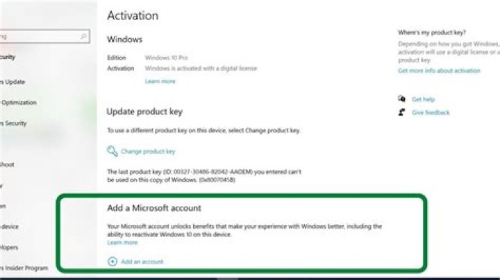 How do I manage the link between a Windows 10 license and a Microsoft account?