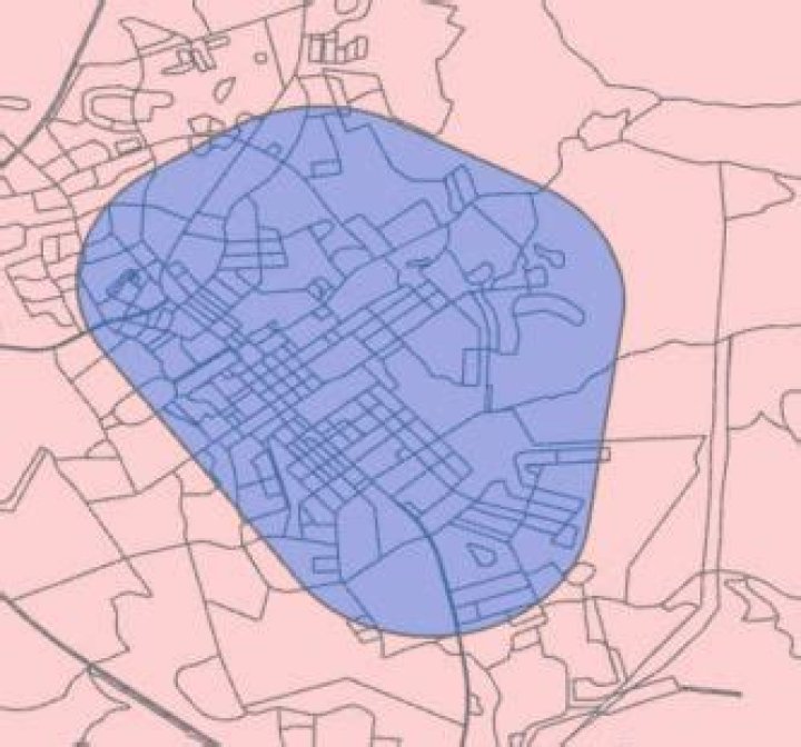 How to calculate a sum of an area-weighted polygons within a polygon in R?