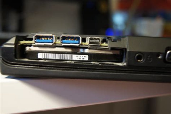 How to pull out hard drive on Lenovo T430 laptops?