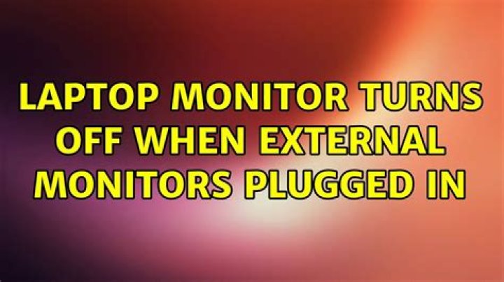 Laptop monitor turns off when external monitors plugged in