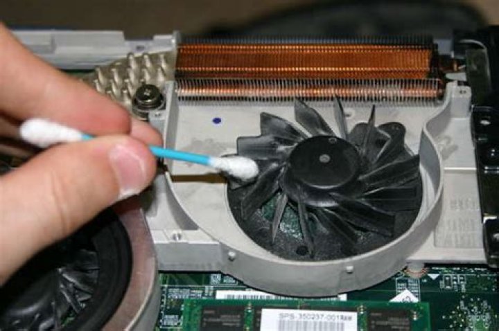 Rattling laptop fan after applying compressed air