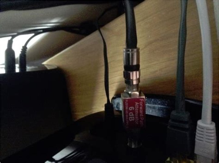 What is the cable that runs from the cable modem to a wall outlet