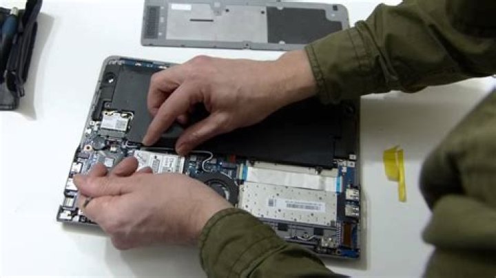 What is the function/purpose of the pinhole on the battery of a Samsung Series 5 ultrabook?